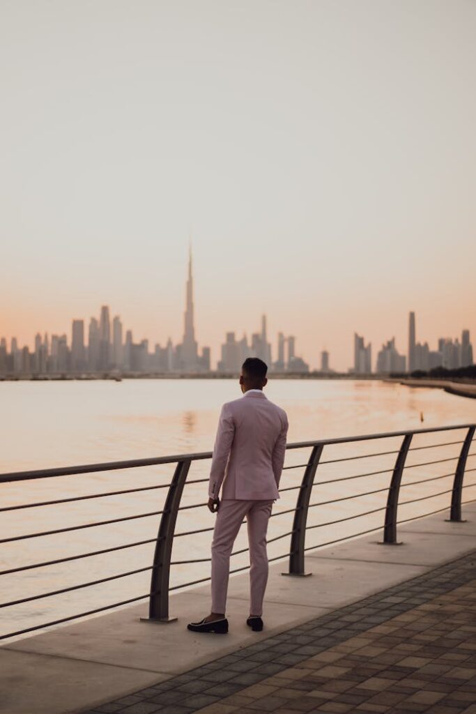 pexels-photo-3310799 Photo Of Man Standing Near Handrails